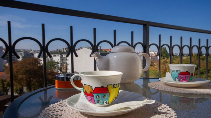 One bedroom flat Dorcol view balcony morning coffee